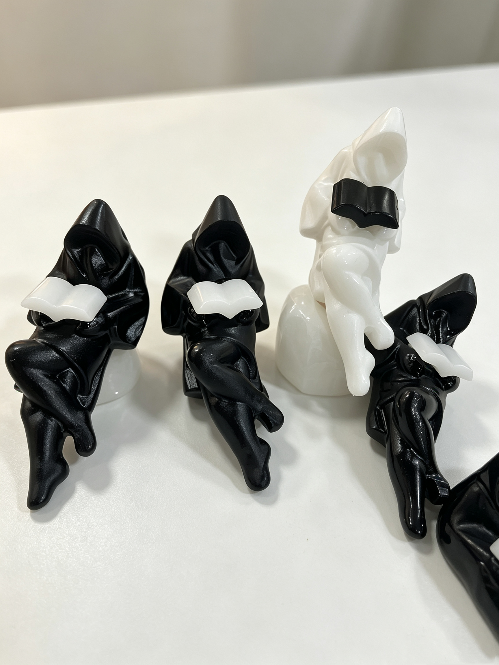 13cm reaper reading a book carving