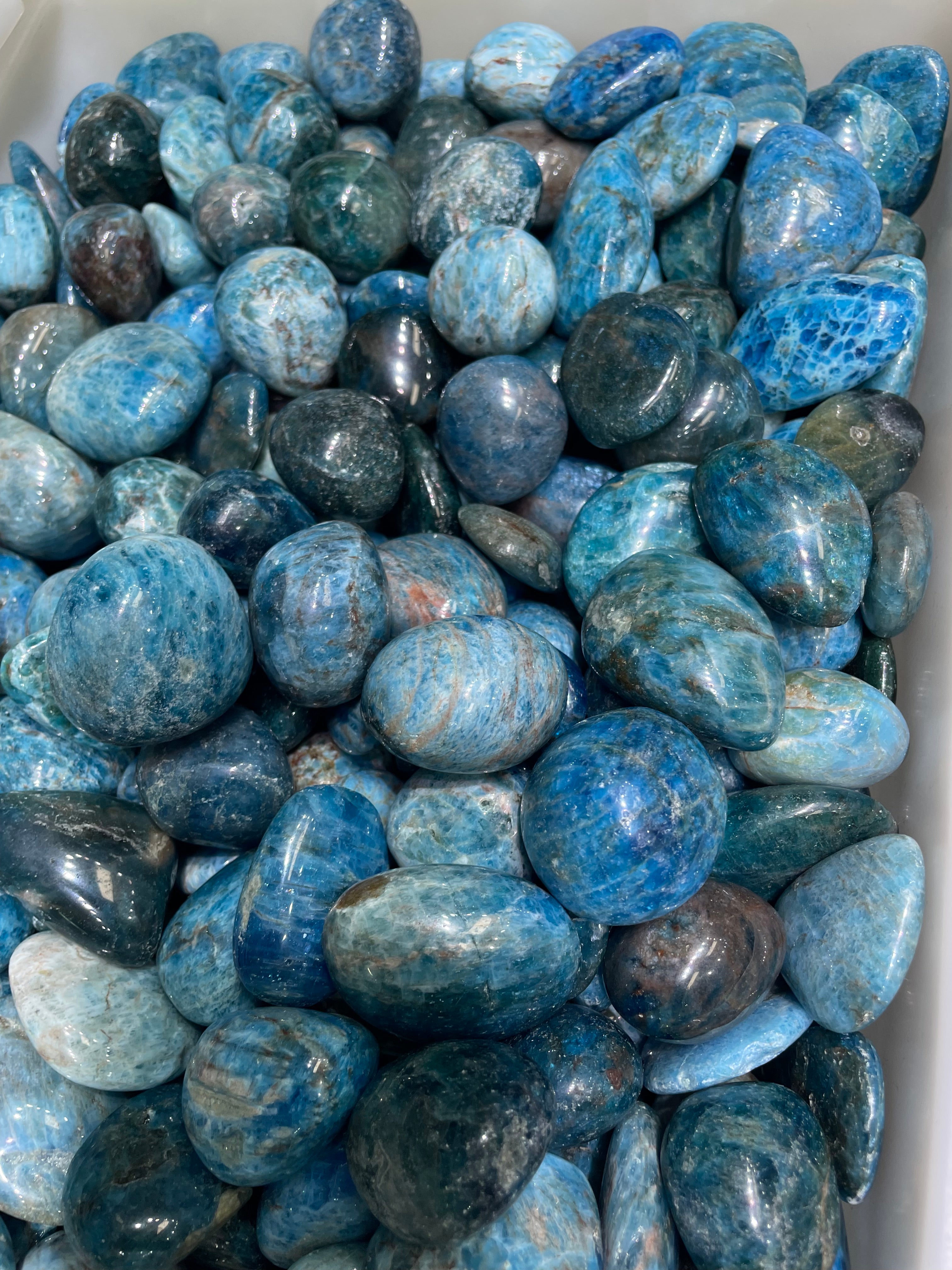 Blue apatite tumbles