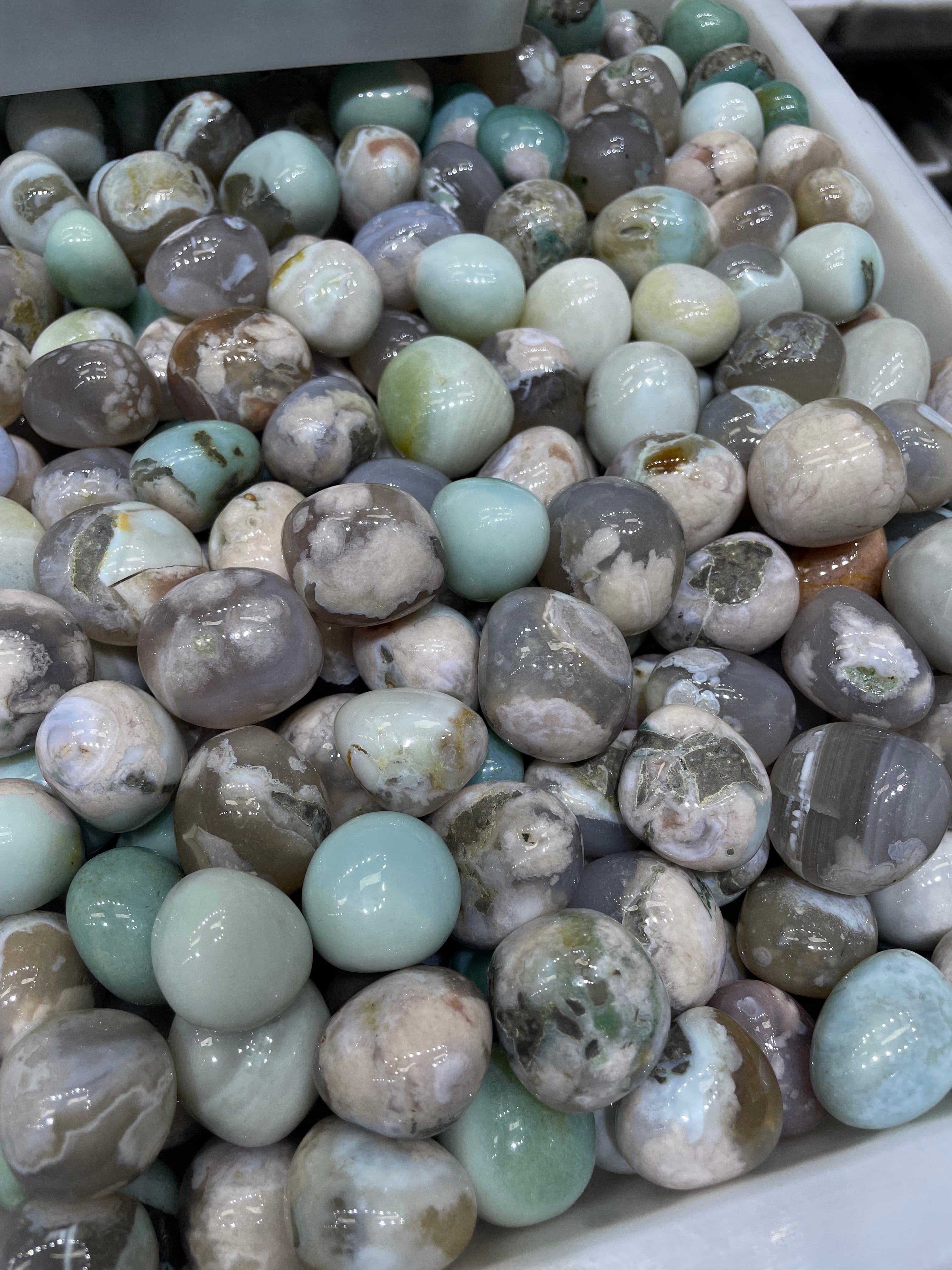 green flower agate tumbles