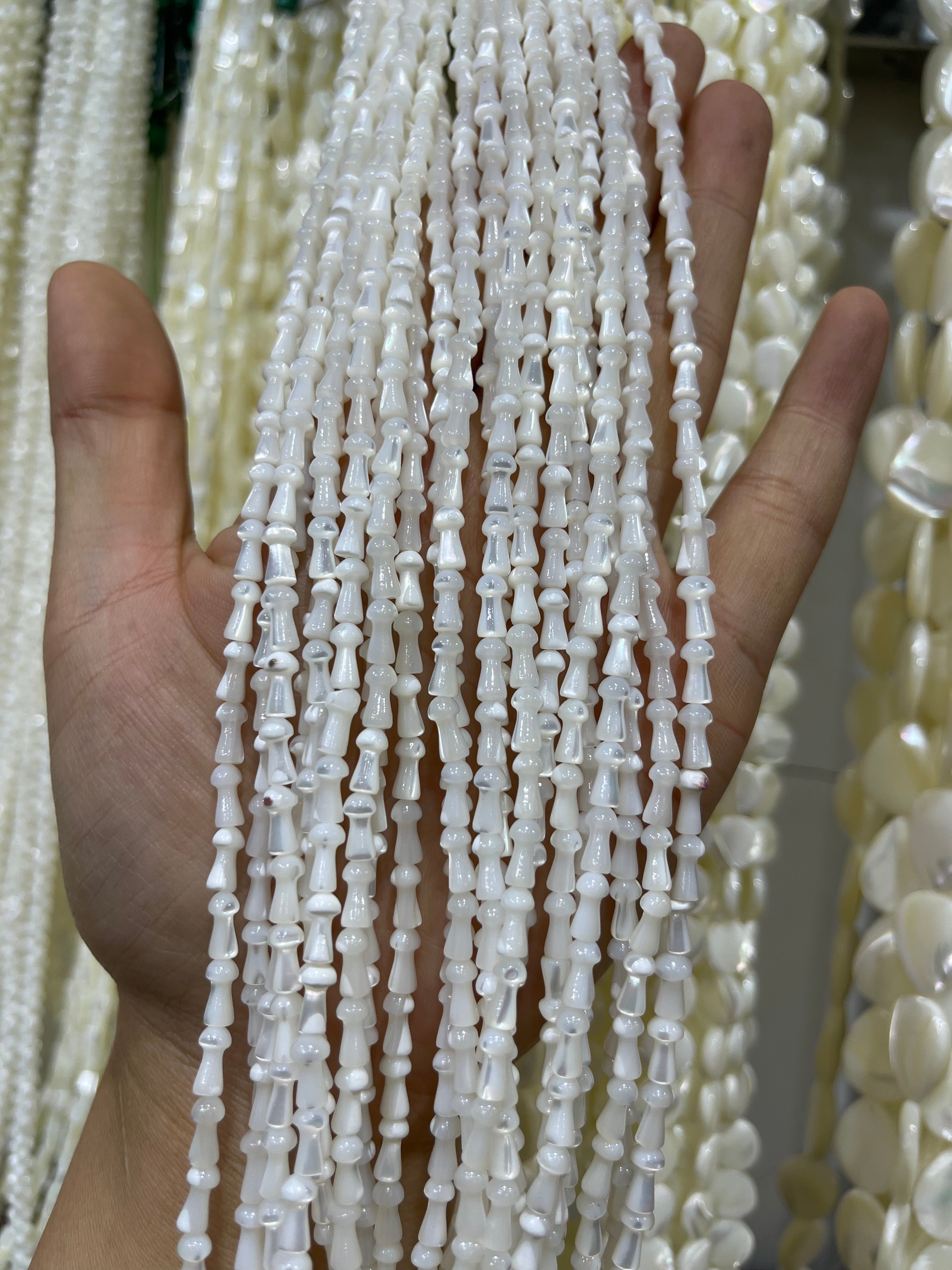 white shell mushroom beads strand