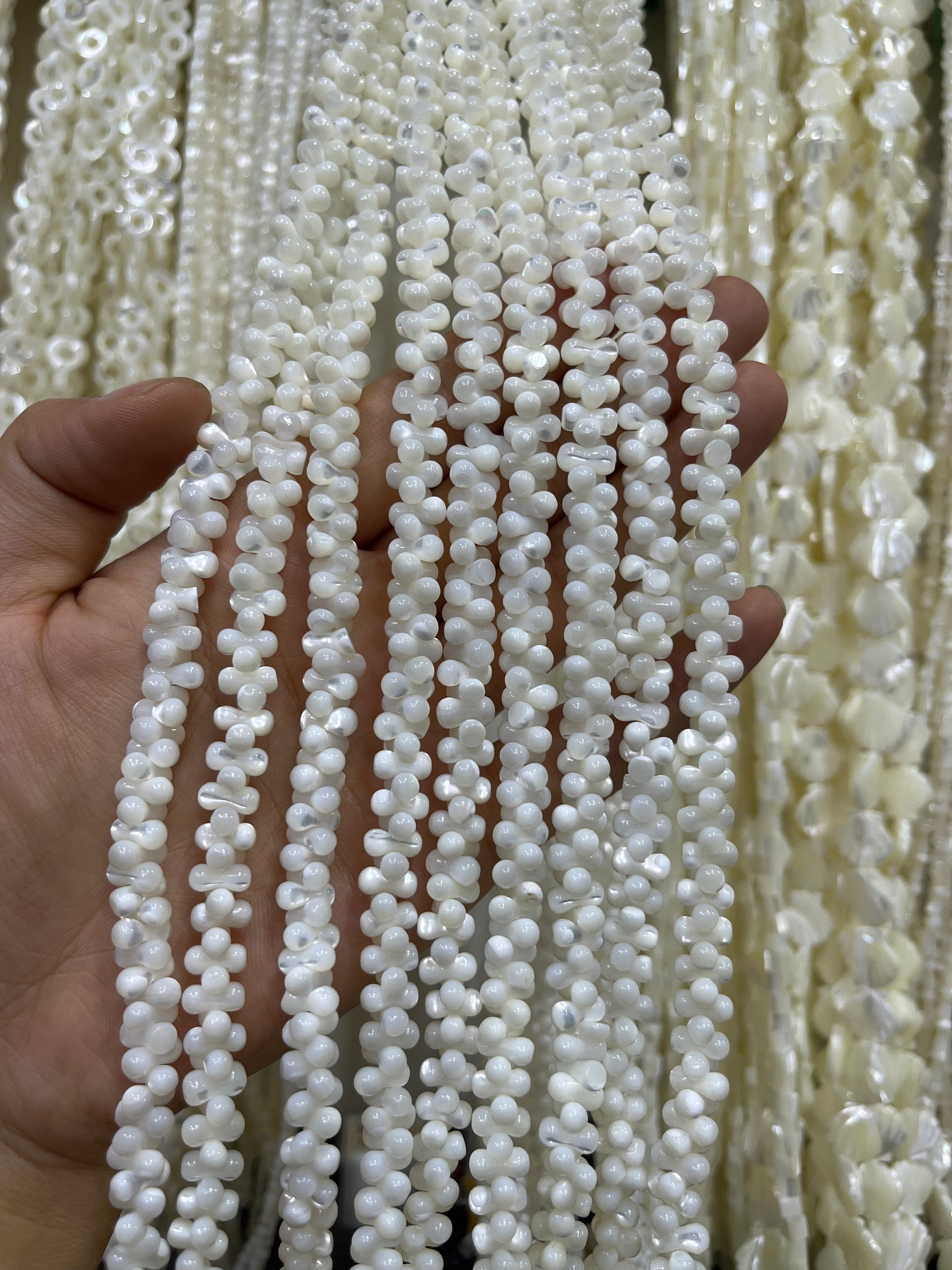 white shell stacking bone beads strand