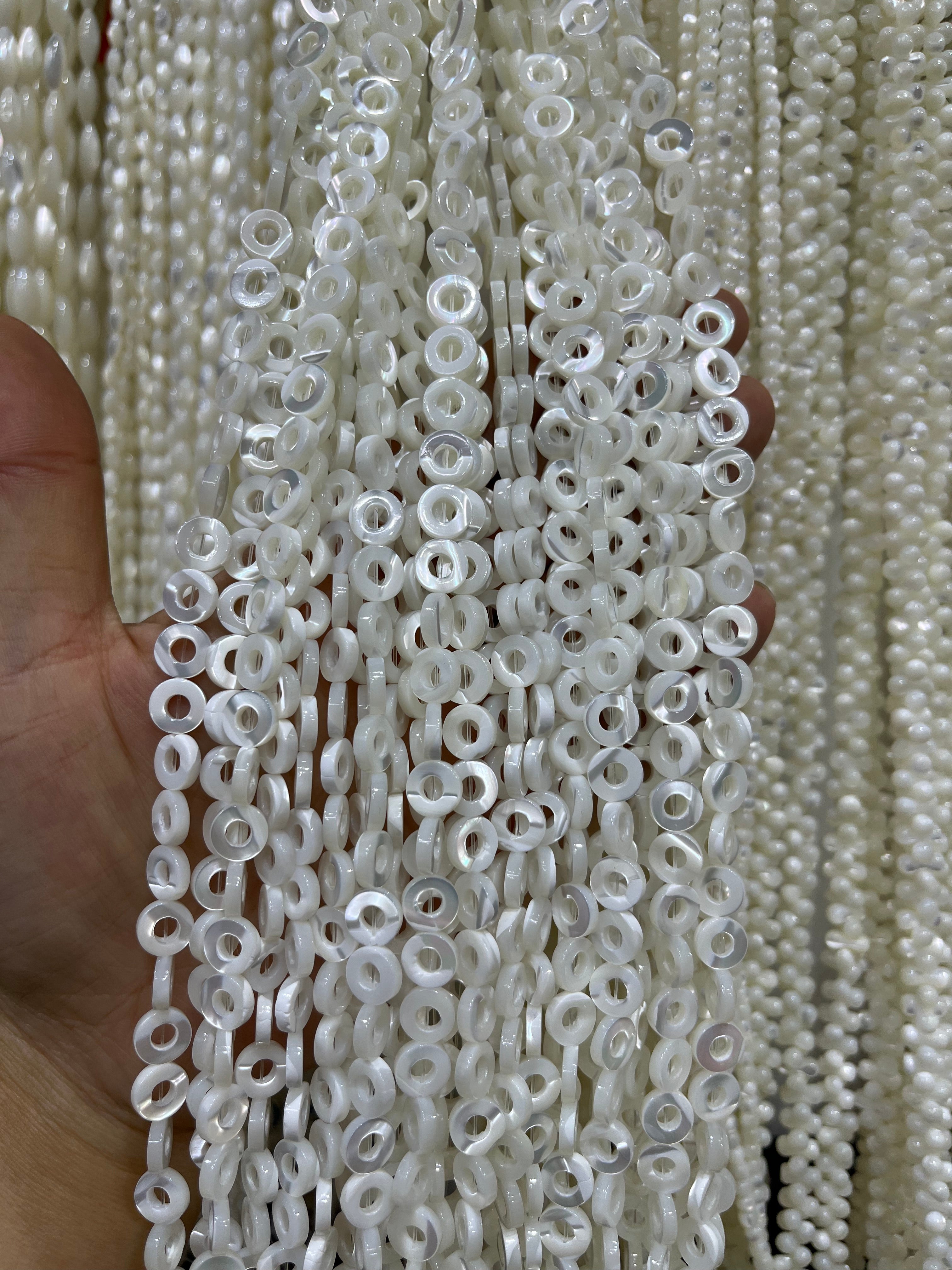 white shell donut beads strand