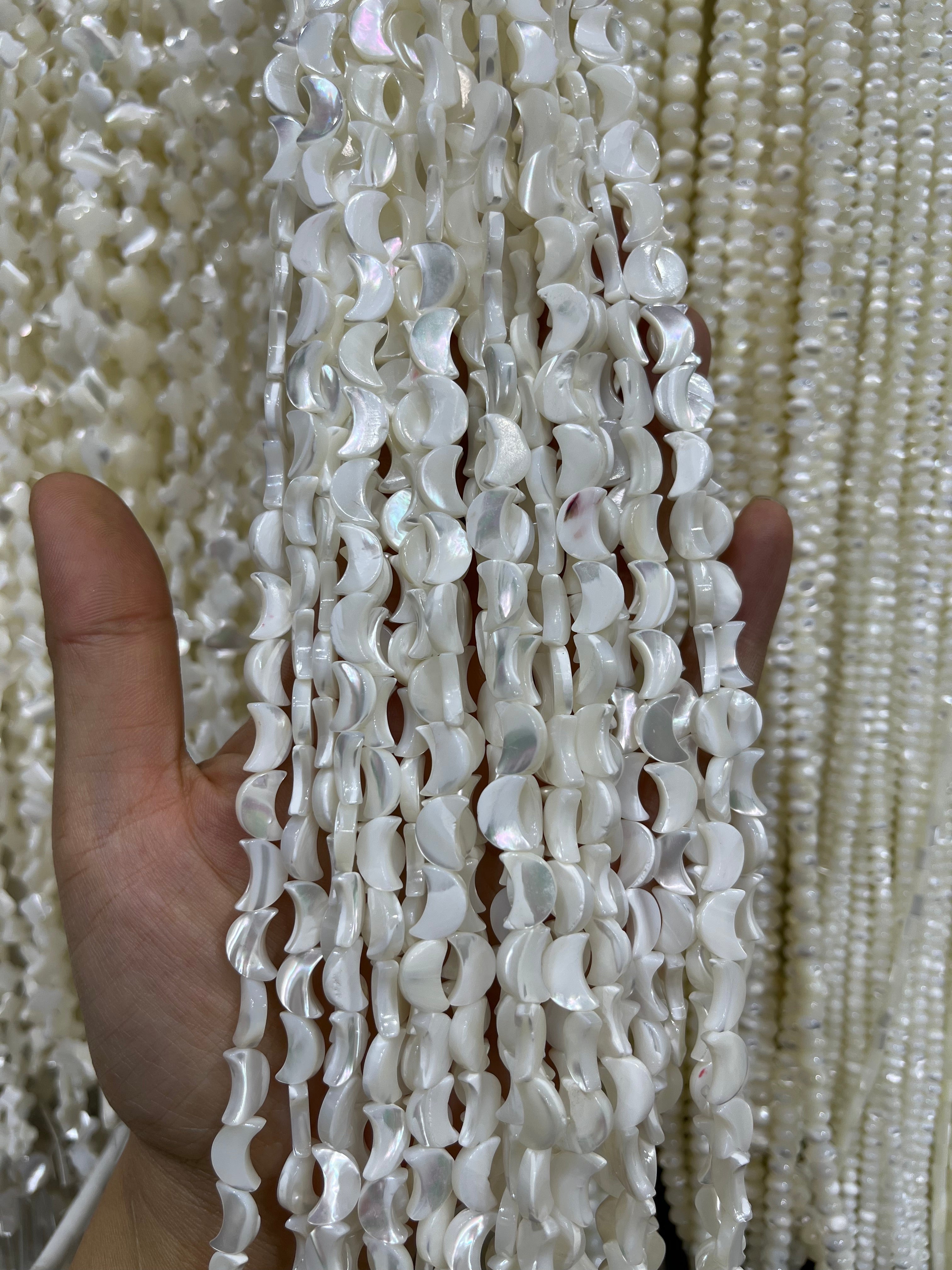 white shell moon beads strand