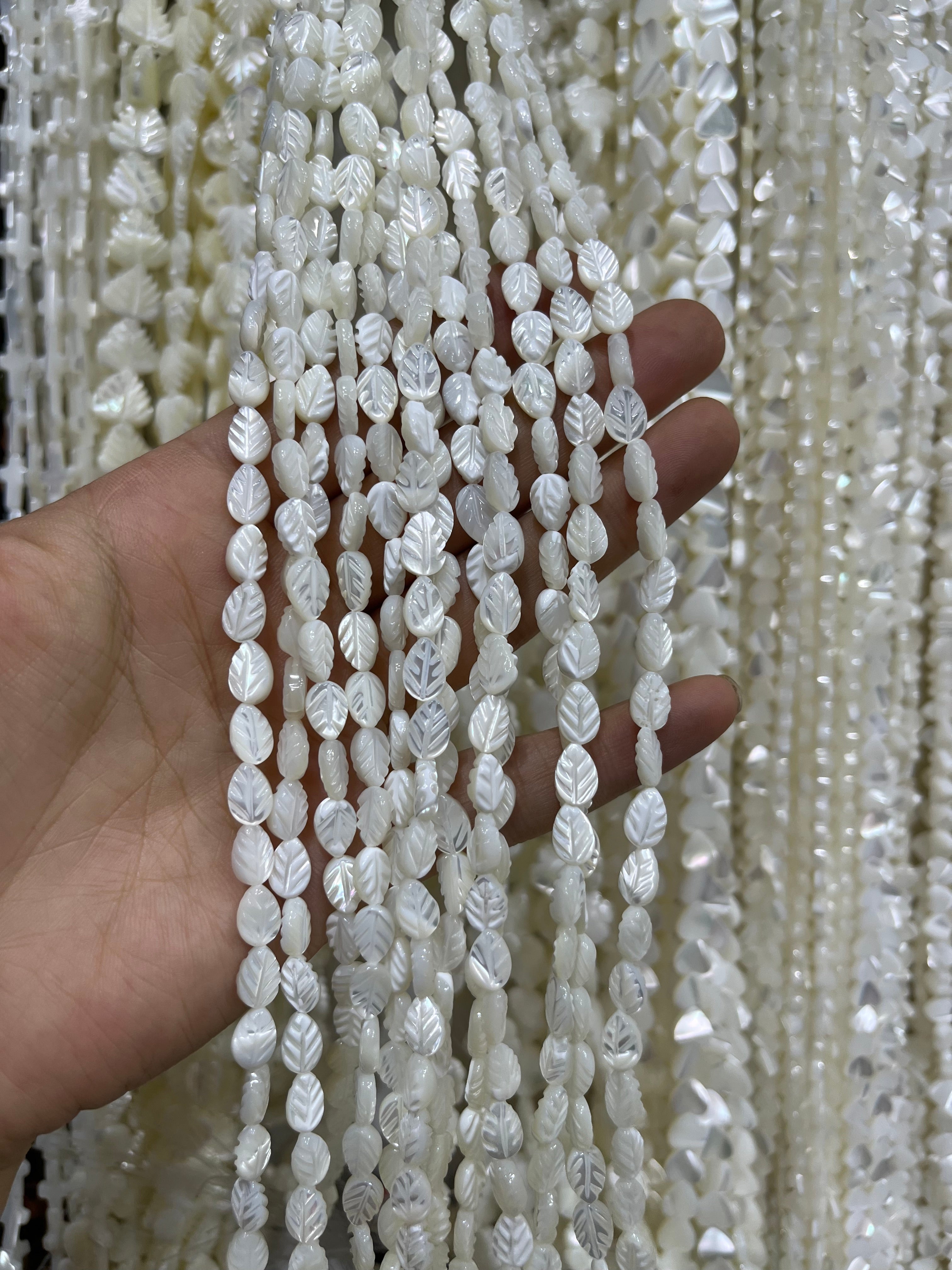 white shell leaf beads strand