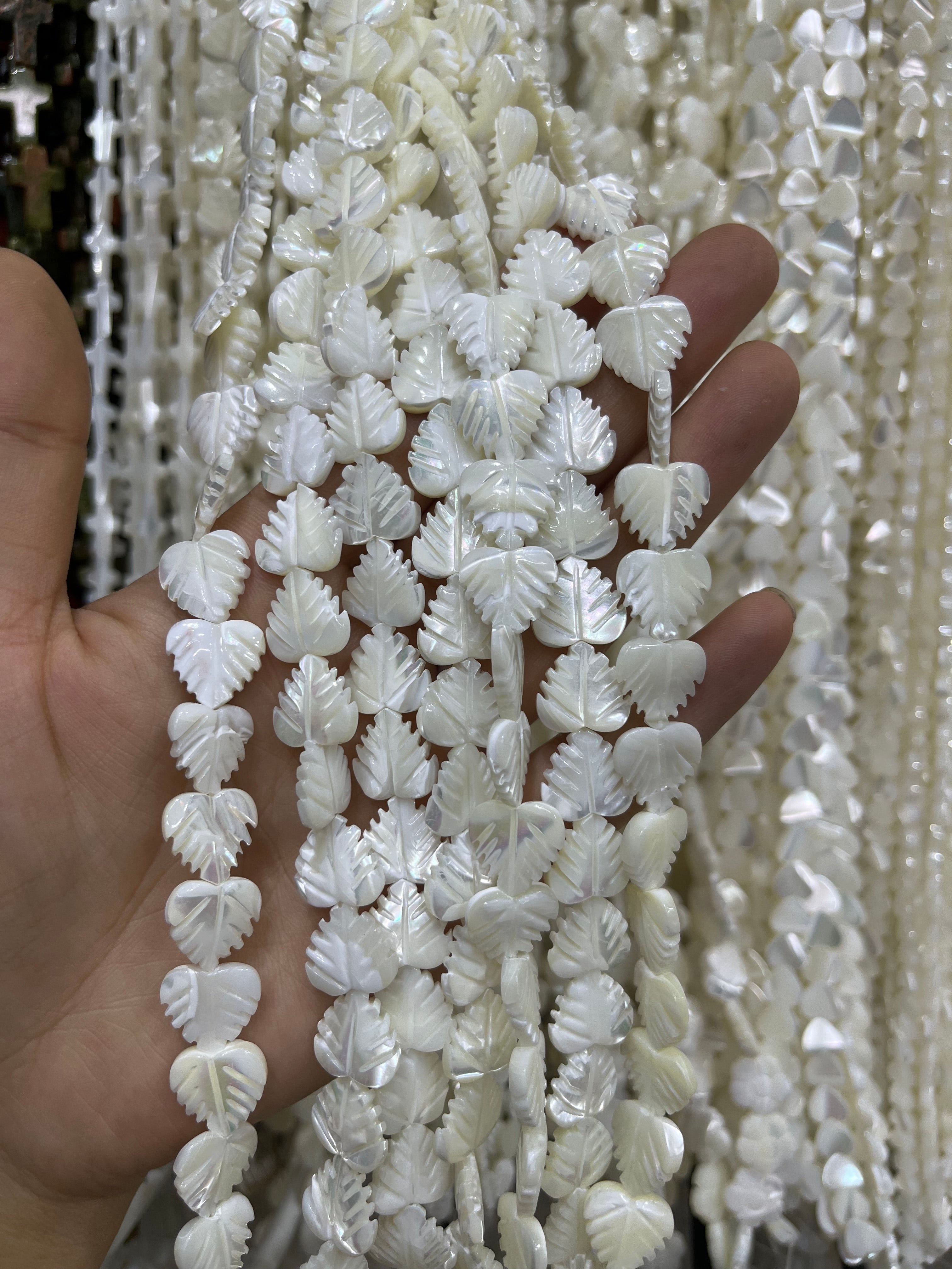 white shell leaf beads strand