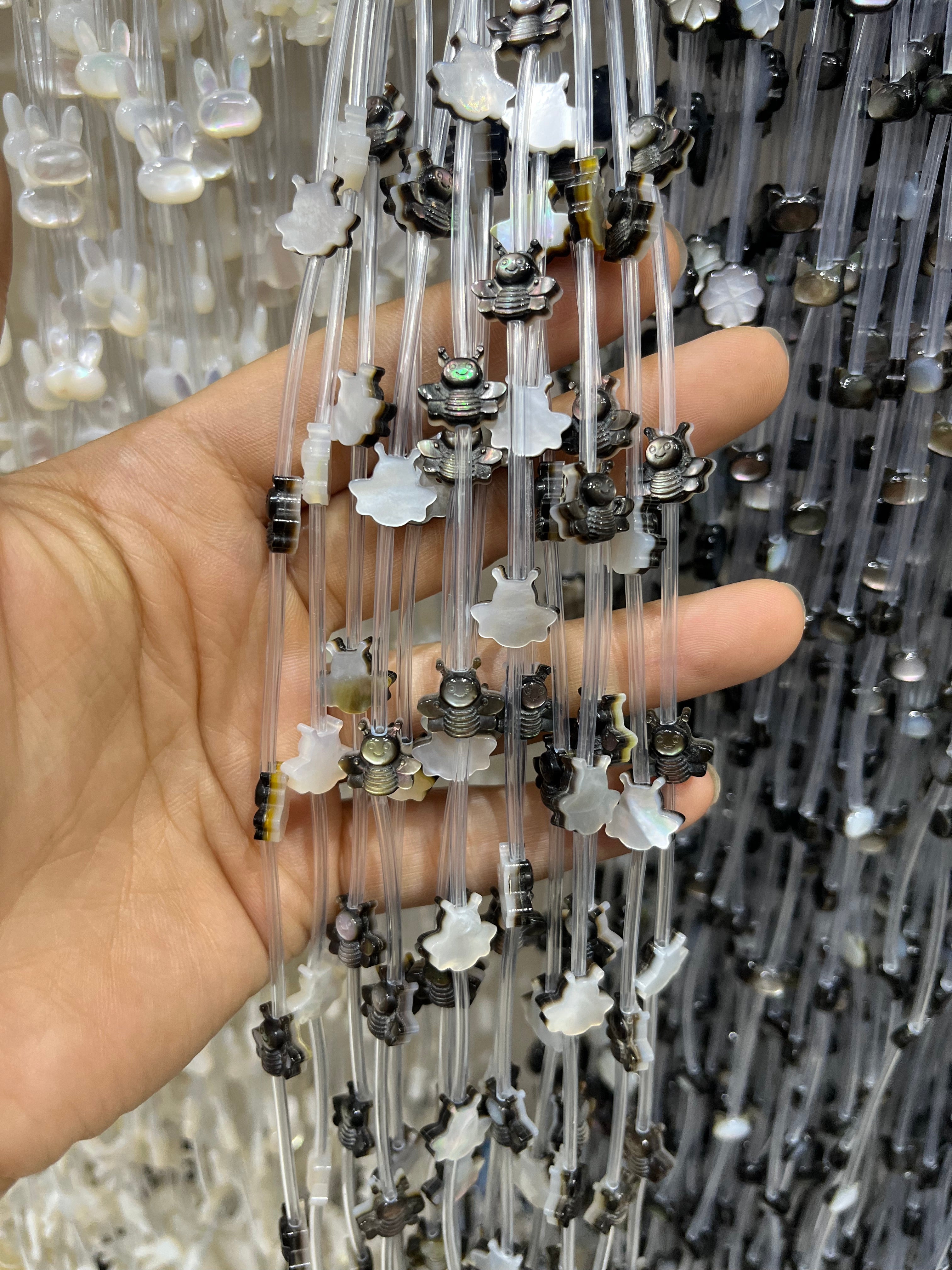 black shell bee beads strand