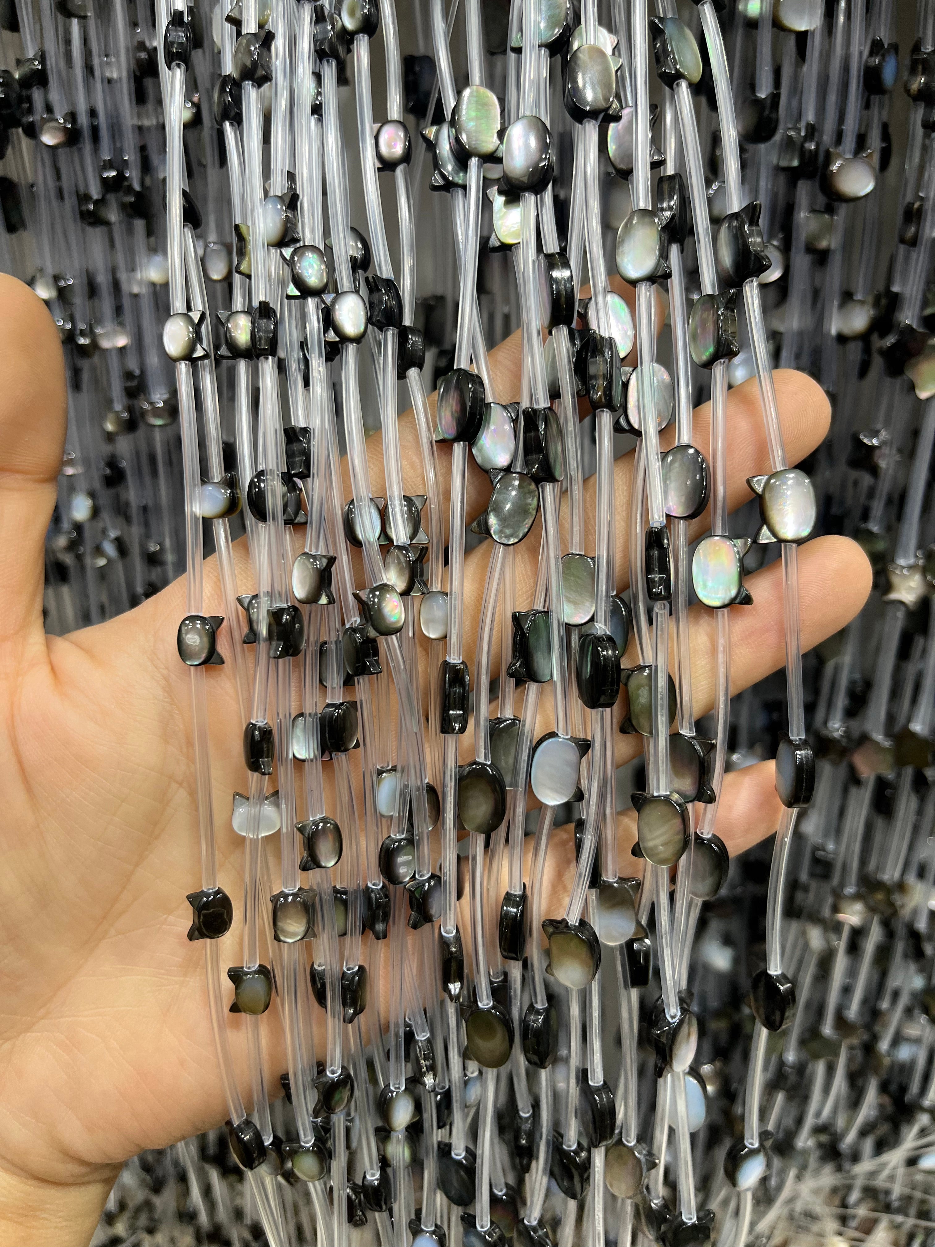 black shell cat head beads strand