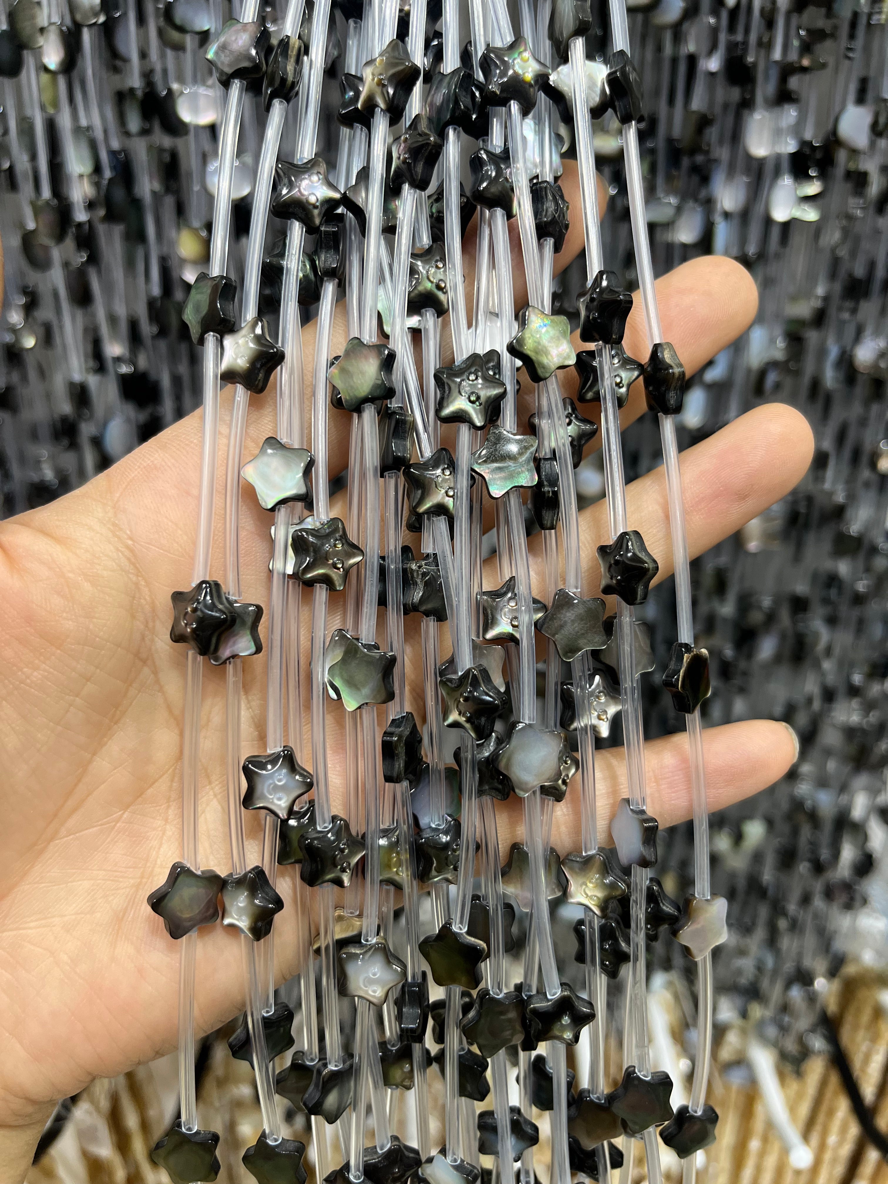 black shell star beads strand
