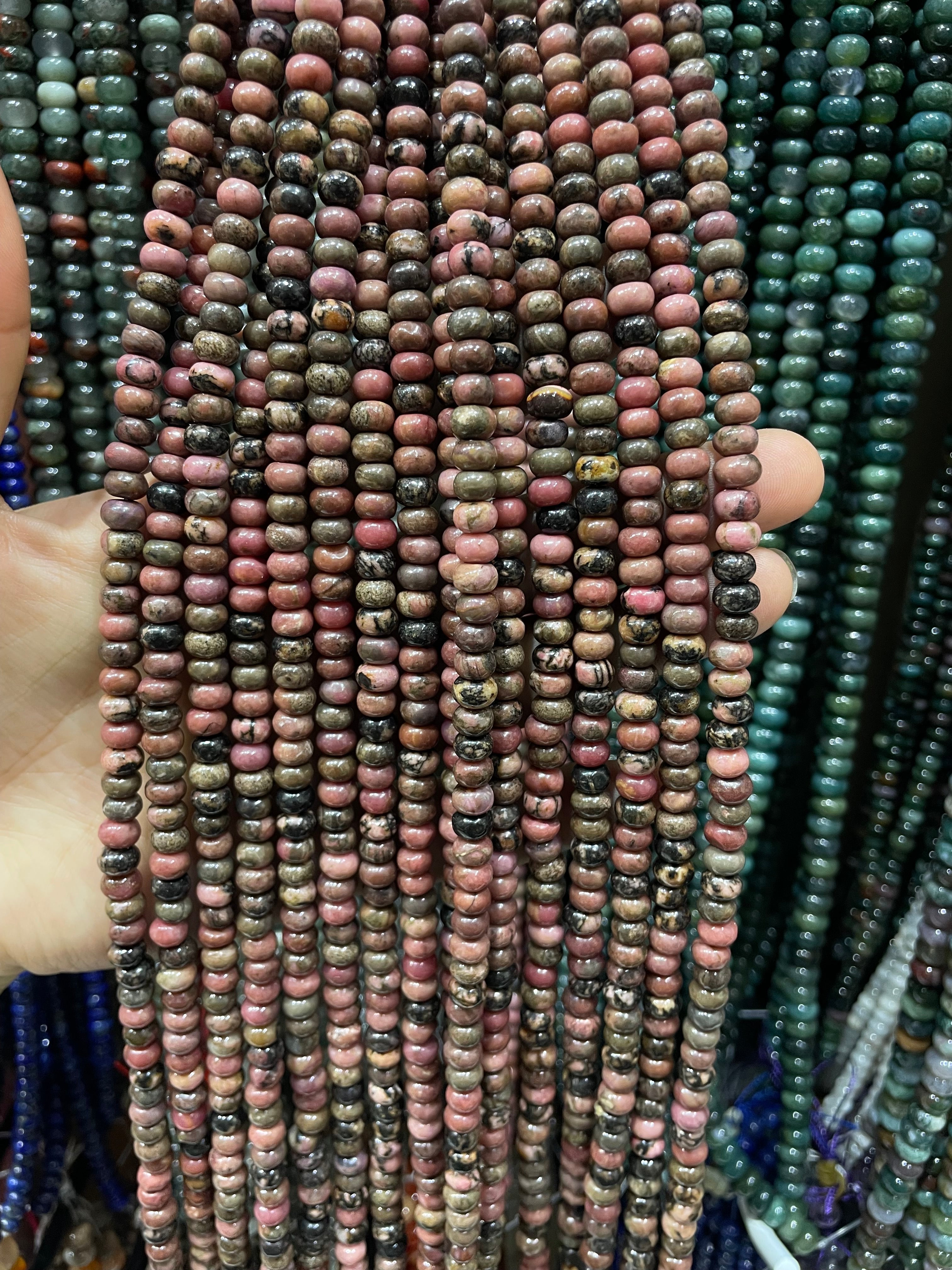 rhodonite donut beads strand 6/8mm